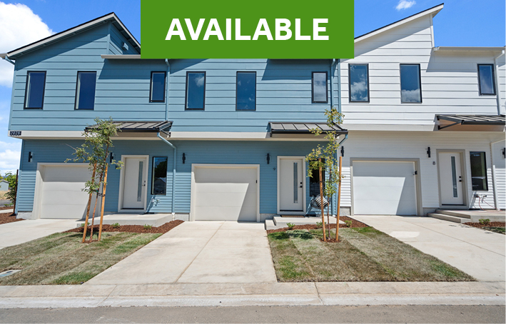 Row of modern townhomes at Sunwood Addition in West Medford, with one unit marked available.